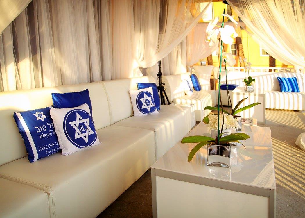 Core Concepts is your go-to event planner for bar mitzvahs and bat mitzvahs. We design simple centerpieces, gift bags, event invitations and banners, and more.